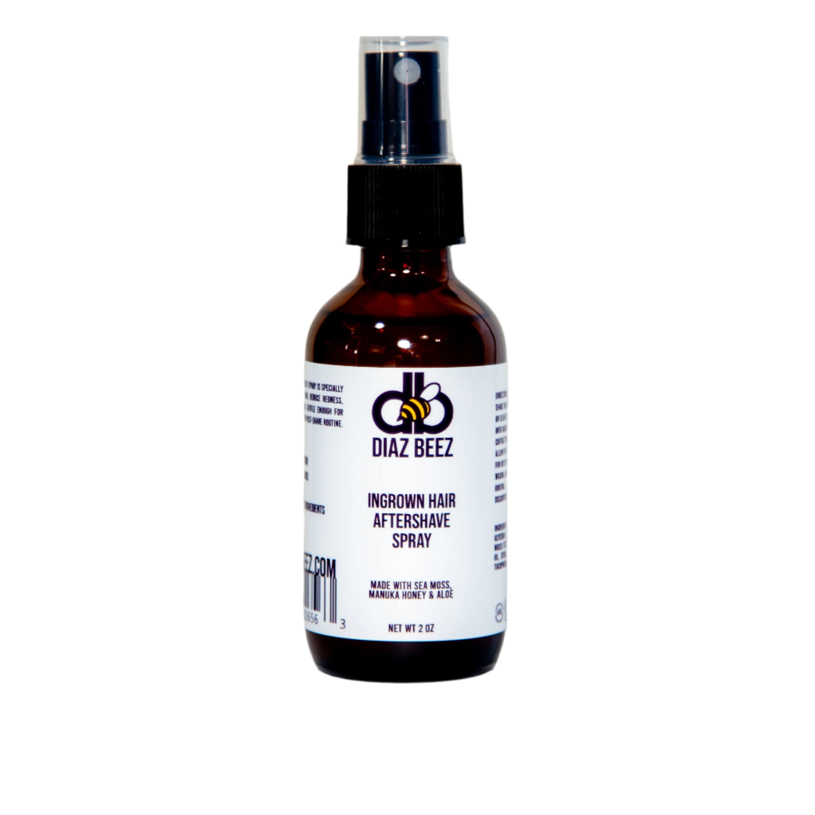 A bottle of Diaz Beez Ingrown Hair Aftershave Spray, featuring a brown design with a black spray nozzle, is elegantly presented against a plain white background. The white label displays the logo and product details, highlighting its enhancement with natural ingredients.